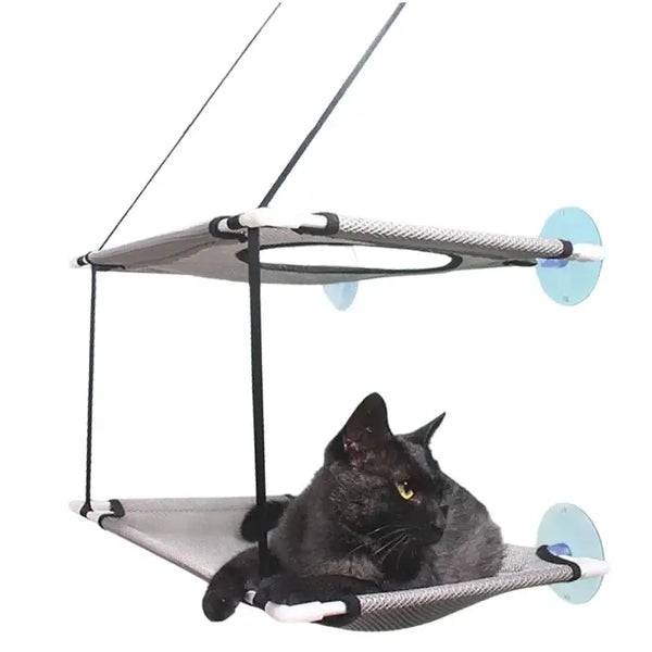 Hamac de fenêtre pour chat avec un chat noir profitant d'une vue extérieure relaxante